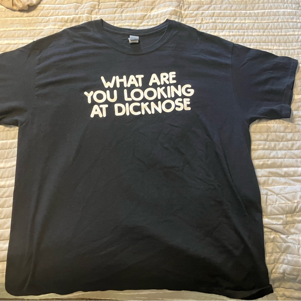 As seen on classic TeenWolf movie - black tee shirt.